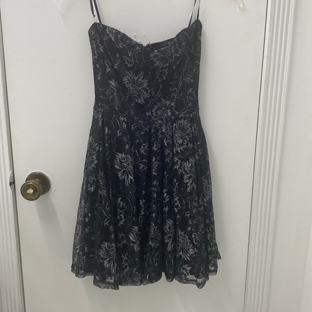 Strapless black dress. Size S but altered to fit an XXS